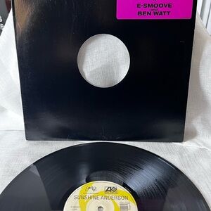 Black Vinyl Record with Pink and Yellow Labels